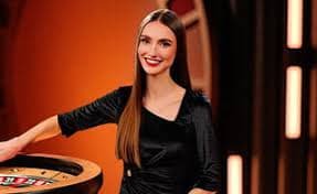 Tampilan jadwal pertandingan dengan opsi pembayaran di coloksg